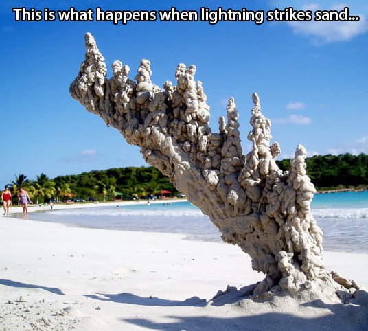 A lightning striking sand