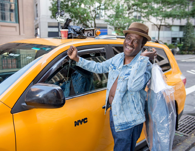 NYC taxi driver posing for a funny calendar.