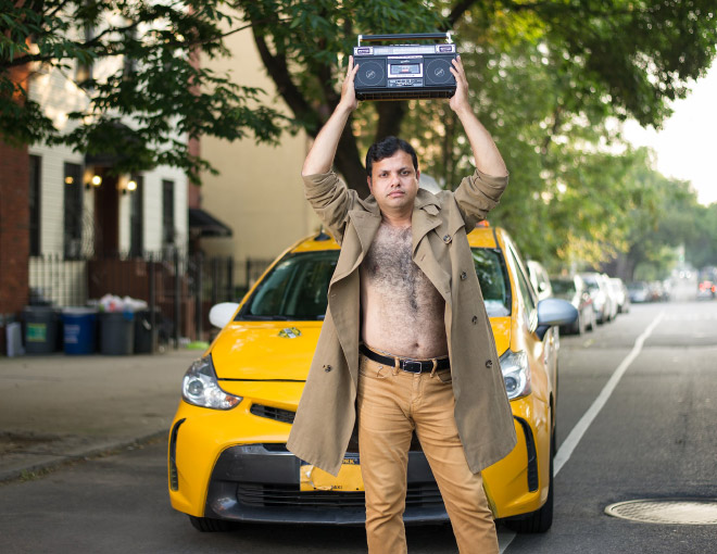 Hilarious taxi driver posing for a calendar.