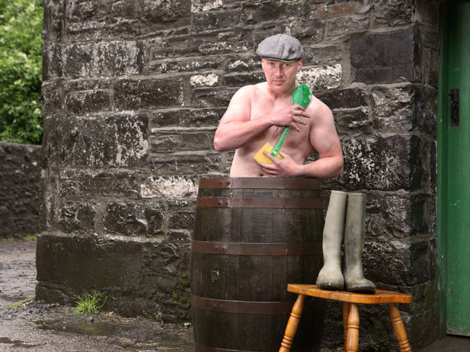 Irish farmer taking a bath.