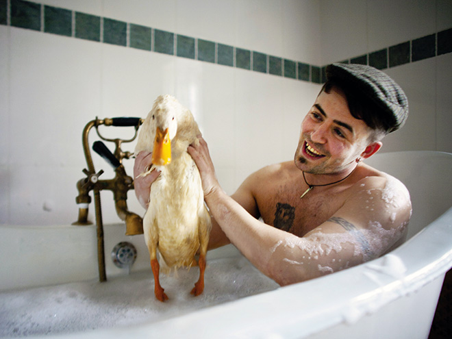 Taking a bath with a duck.