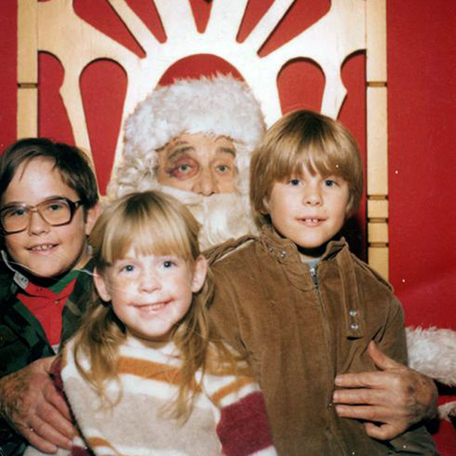 Awkward family photo with Santa.
