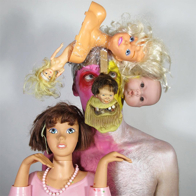 Crazy self portrait with dolls.