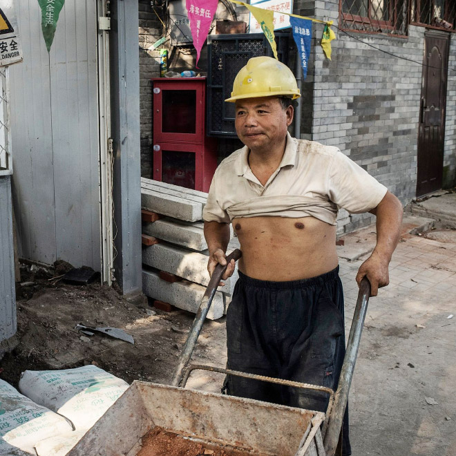 Construction worker wearing a Beijing bikini.