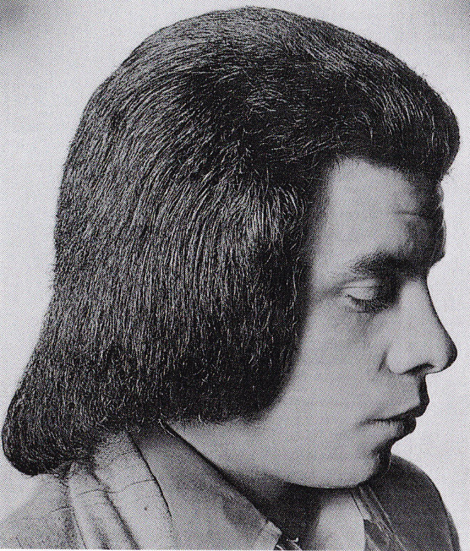 Typical men's hairstyle in 1970s.
