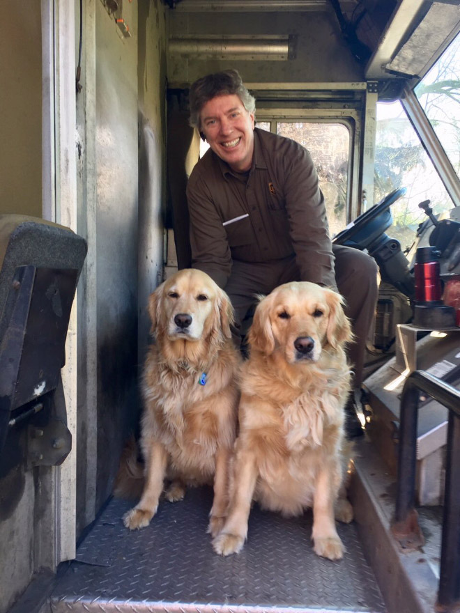 UPS drivers sometimes meet dogs along their daily route...